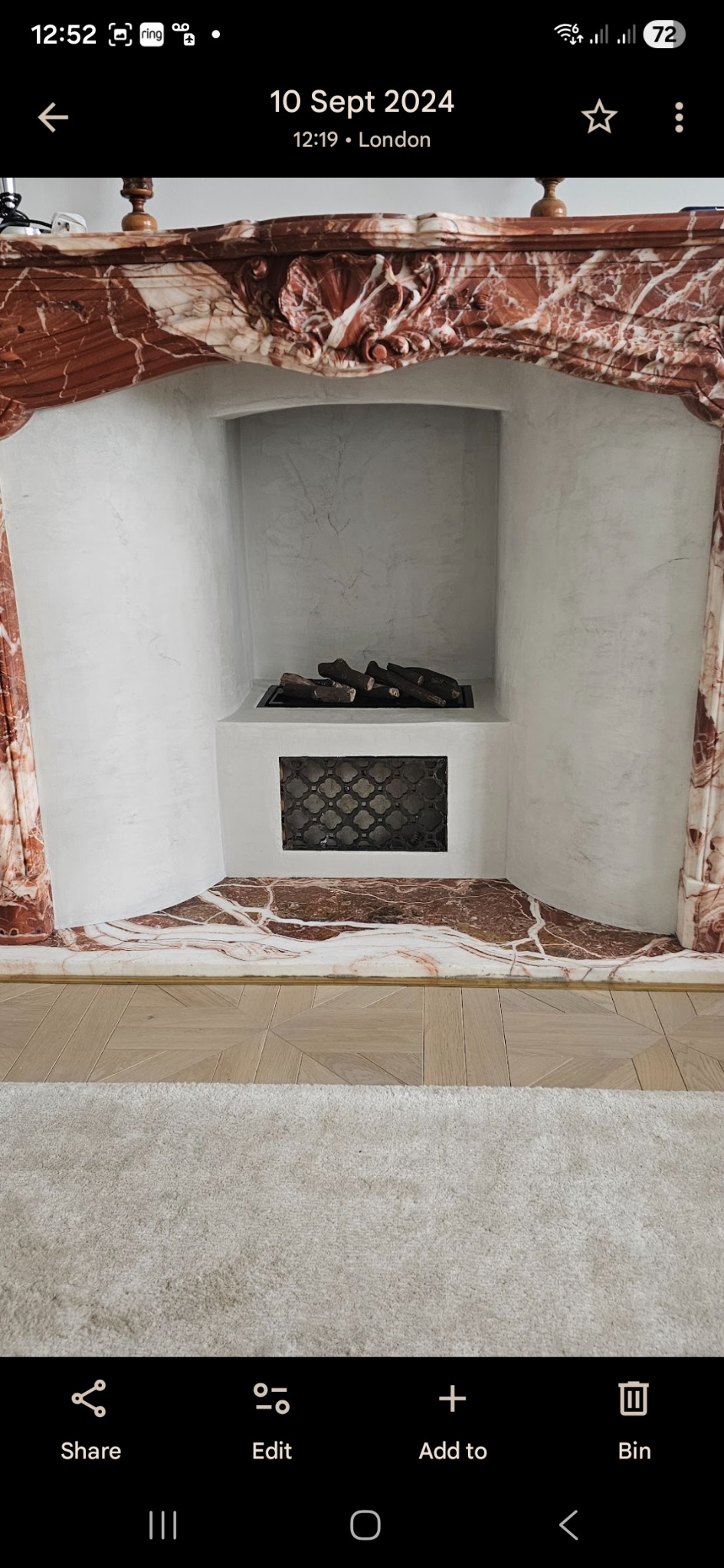 Microcement finish inside a marble fireplace